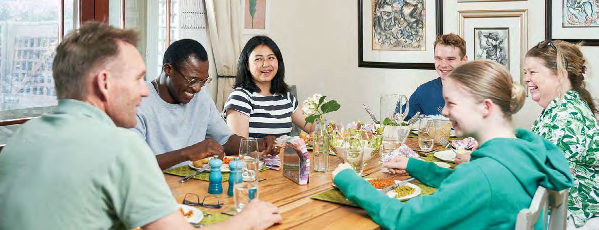 Students around a table in a Cape Town homestay